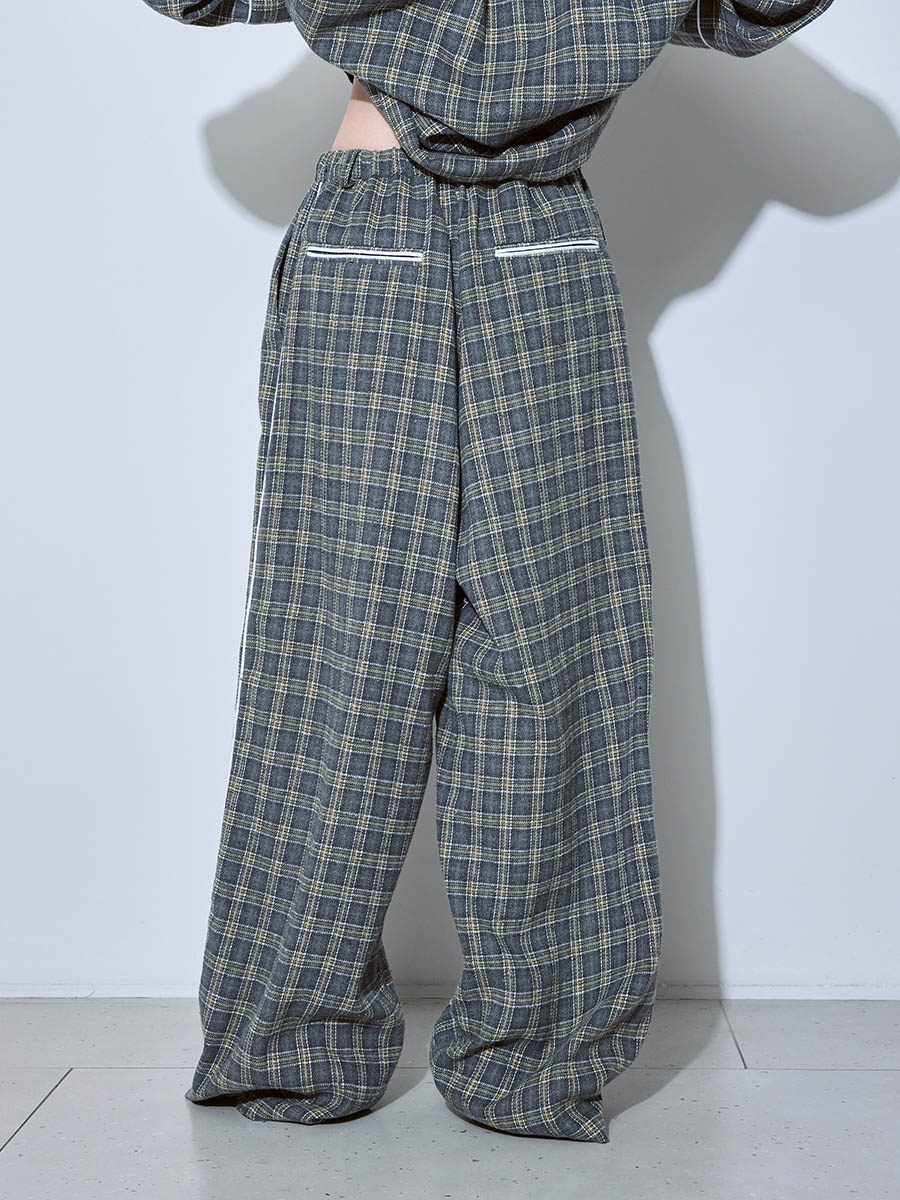 Брюки в клетку серые 